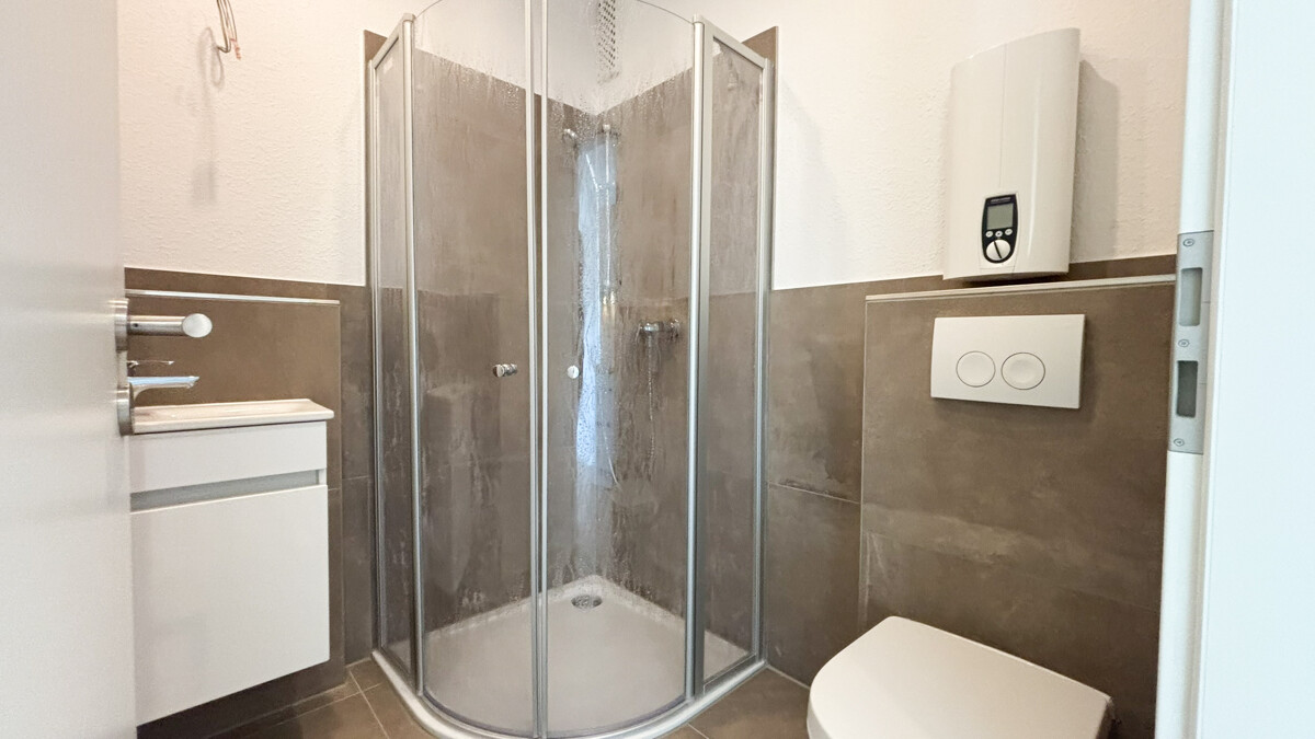 Badezimmer mit Eckdusche und Fußbodenheizung Badezimmer mit Eckdusche und Fußbodenheizung - Objekt 9790